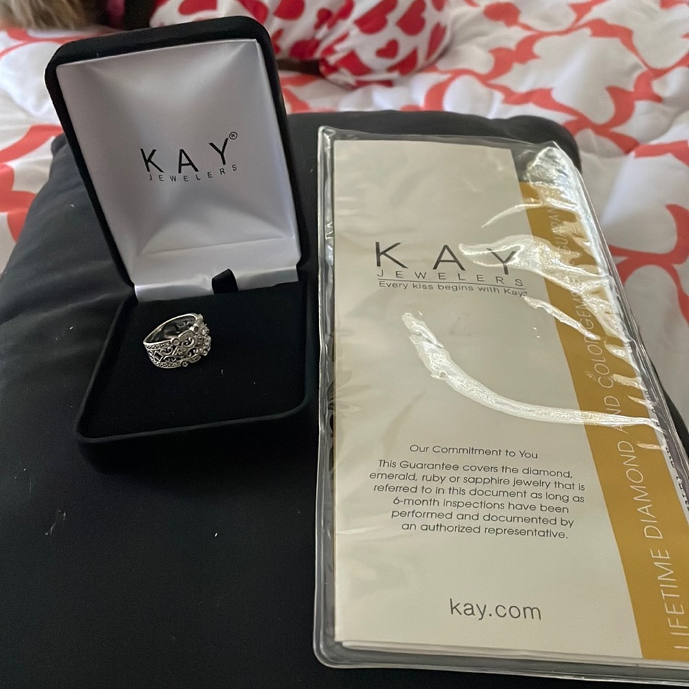 Size 5 silver diamond ring.